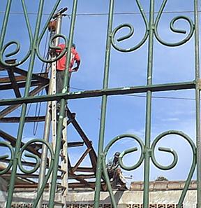 Guys up high with welding torches